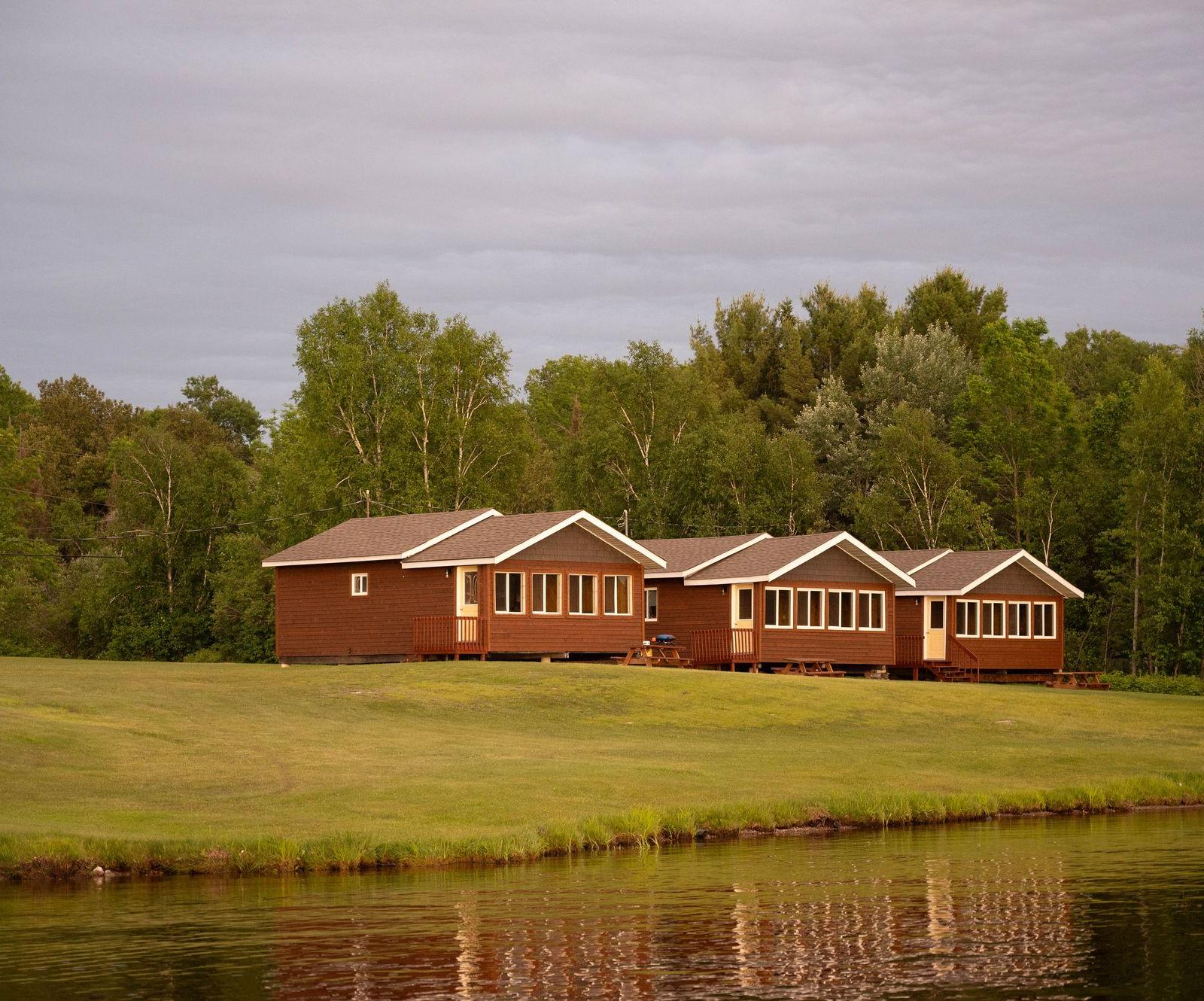 Cottages on the lawn overlooking Tomiko Lake