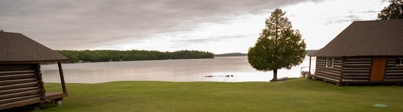 Cottages framing the lake at Tomiko Lake Lodge